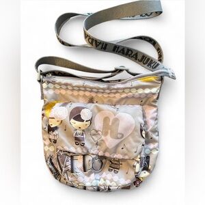 HARAJUKU LOVERS crossbody satin bag. Very good condition, pink/mauve color.